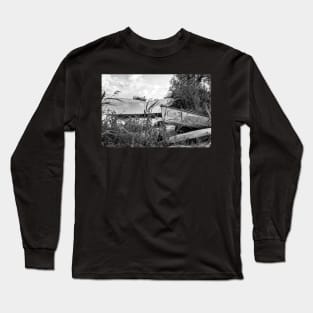 Old canoes and kayaks on the river bank in Thurne, Norfolk Long Sleeve T-Shirt